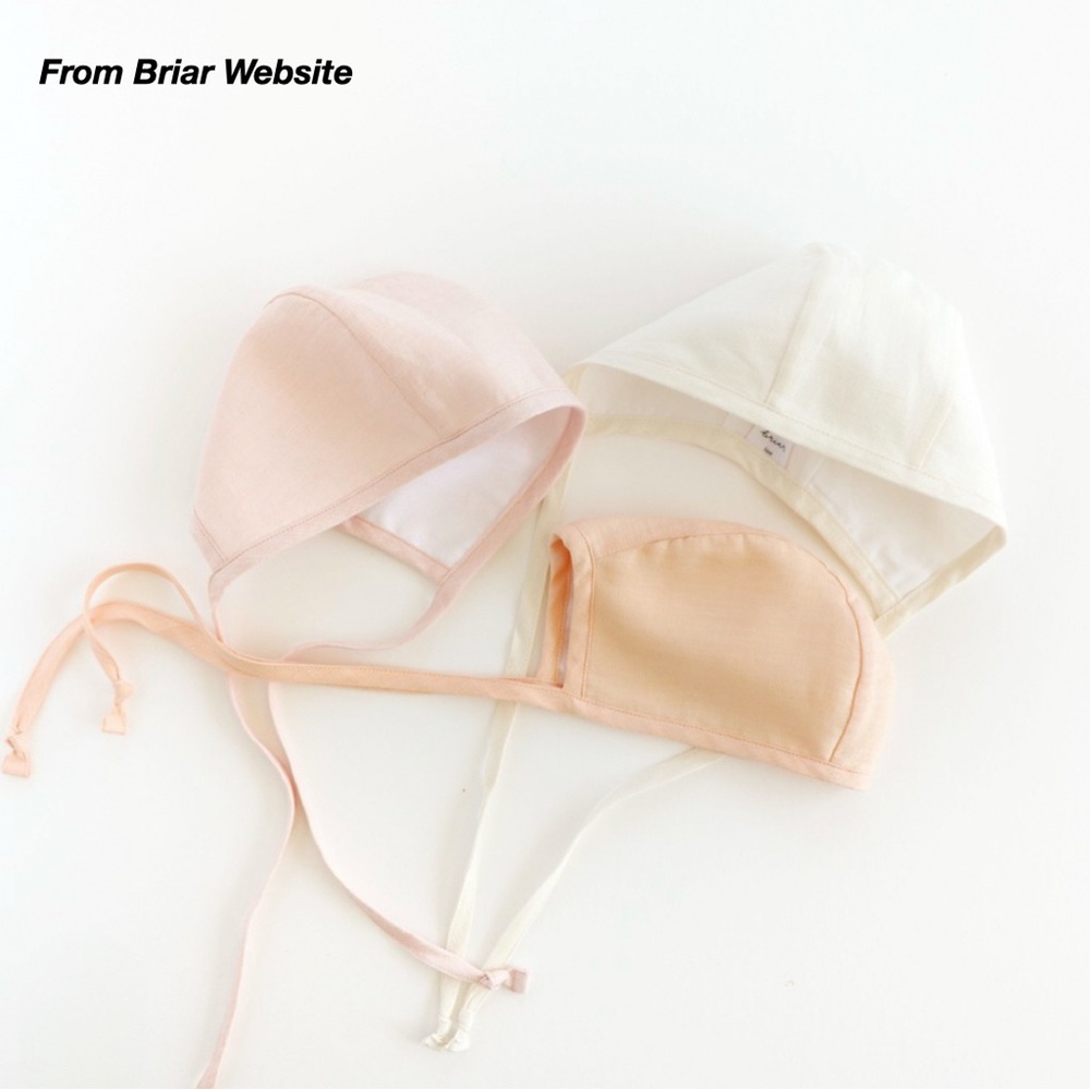 EUC: 2 BRIAR BRIMLESS BONNETS IN DESERT TRAILS AND PEACH (6-12M)